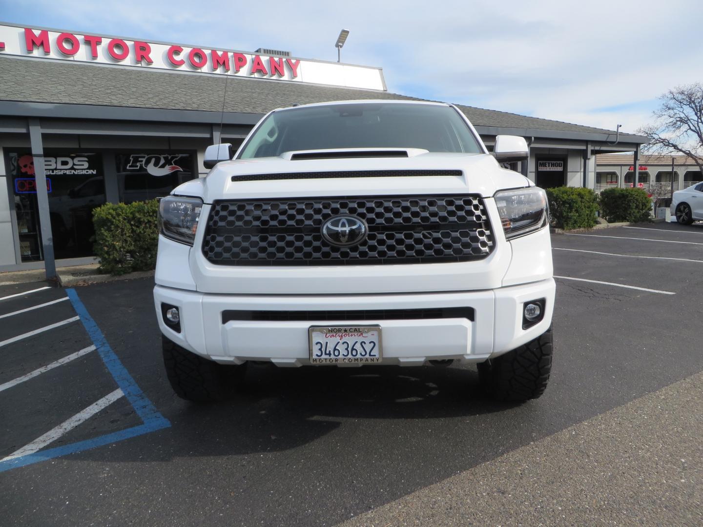 2019 White /BLACK Toyota Tundra SR5 5.7L V8 CrewMax 4WD (5TFDY5F19KX) with an 5.7L V8 DOHC 32V engine, 6A transmission, located at 2630 Grass Valley Highway, Auburn, CA, 95603, (530) 508-5100, 38.937893, -121.095482 - Clean leveled Tundra with 20" Fuel Maverick wheels, Nitto Ridge Grappler tires, N-Fab running boards, Snug Top camper shell with Yakima racks. - Photo#1